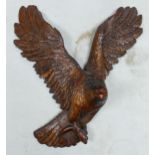 A large hand carved figure of Eagle. Height 40cm