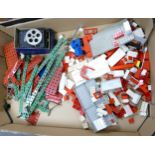 A collection of vintage lego and meccano parts