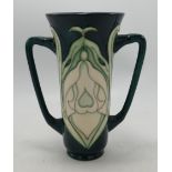 Moorcroft twin handle trumpet vase in the snowdrop design: Moorcroft collectors club piece , seconds