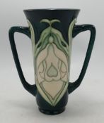 Moorcroft twin handle trumpet vase in the snowdrop design: Moorcroft collectors club piece , seconds