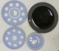 A collection of Wedgwood jasperware plates: including black basalt large platter and three