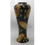 Cobridge stoneware vase decorated with leaves: Dated 2003, height 30cm