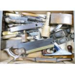 A collection of vintage wood working tools to include saws.planes, chisels etc