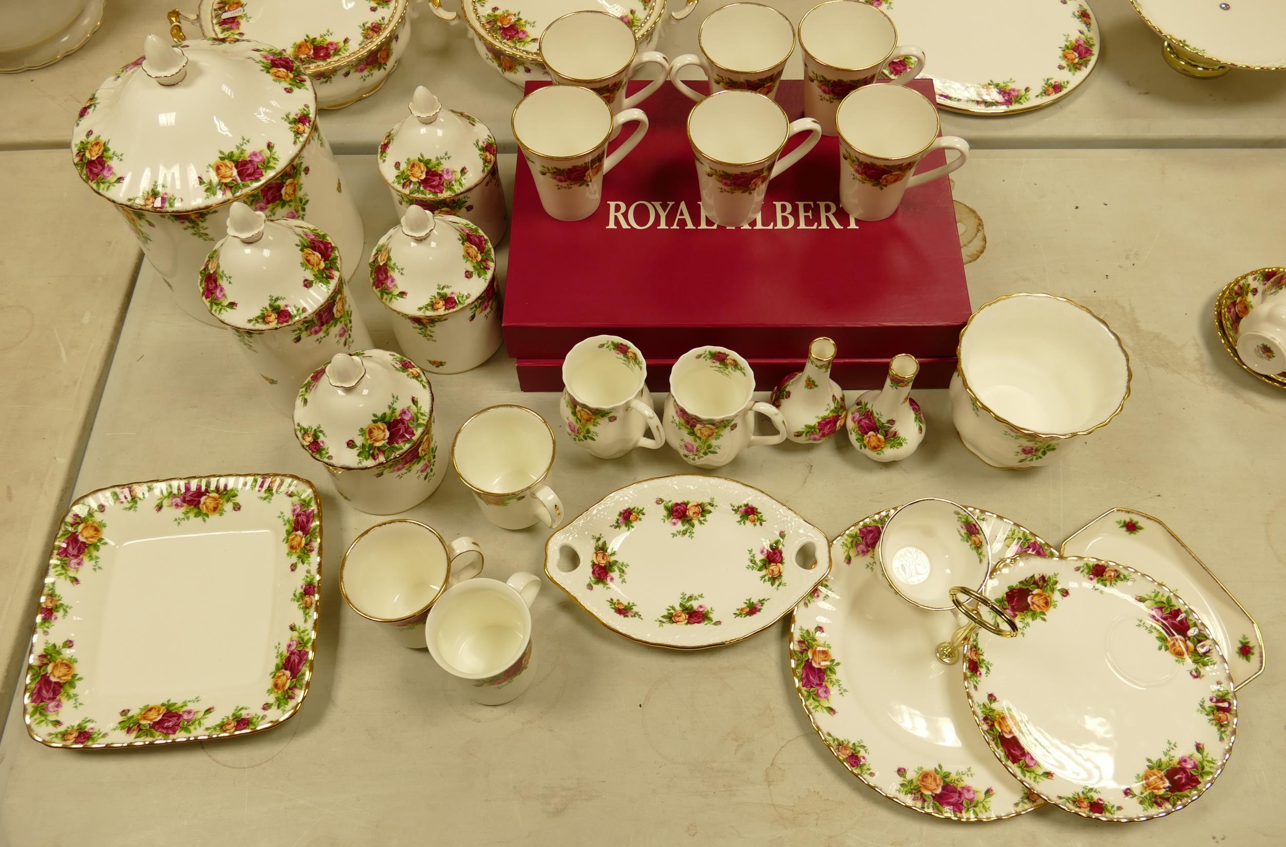 a collection of Royal Albert Old Country Roses: to include storage jars, boxed place mats, mugs,