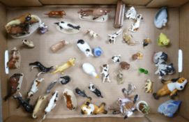 A collection of miniature ceramic animals, dogs, cats :etc (approx 45 items)
