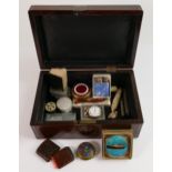 An interesting collection of items including mother of pearl card case, snuff boxes, miniature metal