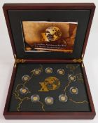 A cased gold coin set, Top 10 explorers of the world: 10 fine gold proof coins each 0.5g, in
