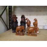 Six African hardwood hand carved figures: 2 x birds, 2 x elephants & 2 x chimps, tallest 30cm in