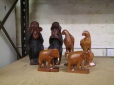 Six African hardwood hand carved figures: 2 x birds, 2 x elephants & 2 x chimps, tallest 30cm in