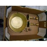 A Brass Jam Pan together with a pair of brass Column form candle stick stands and a graduated set of