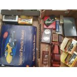 A mixed collection of items to include Parker pen sets, travel chess sets, boxed cars etc (2 trays).