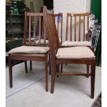 Set of four oak stick back dining chairs