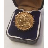 An 1896 Queen Victoria 'Old Head' Half Sovereign mounted in an ornate 9ct gold ring, total weight