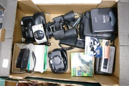 A collection of Compact Film Camera s including Canon Ixus, Olympus trip301, together with