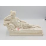Reconstituted Italian marble figure of a recumbent lady.