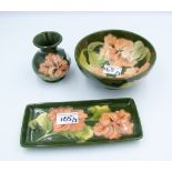 Moorcroft Hibiscus on green ground pen tray: together with hibiscus on green ground footed bowl 16cm