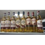 4 bottles of bells whisky together with 2 bottles of famous grouse and 2 bottles of high