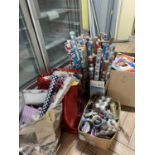 A quantity of stationary items to include cards, gift bags, tissue paper, wrapping paper etc