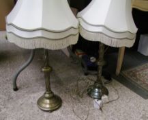 Two brass table lights with twisted column supports (one with missing foot and no cable).