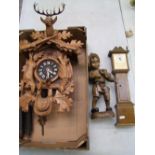 A Wall Mounted Black Forest Type Cuckoo Clock together with Miniature Grandfather clock(a/f) and