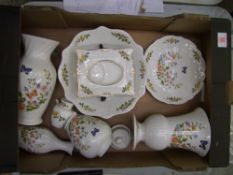 A mixed collection of Aynsley ceramic items in the cottage garden pattern to include vases, lidded