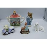 A collection of ceramic items: Wade bear figure in pyjamas, Sadler tennis theme teapot etc (1 tray).