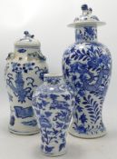 Three Earlier Chinese Blue & White Decorated Vases, damage noted to both lids, tallest 28cm(3)