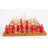 19th century Bone chess set: Height of King 10.6cm, split to white king & two red rooks, 32 pieces