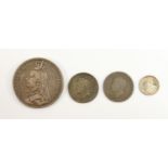 A collection of Silver coins: including two 1825 George VI shillings, 1889 Crown and George V1917