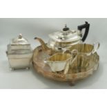 A collection of silver plated items to include tea service, gallery tray, tea caddy etc