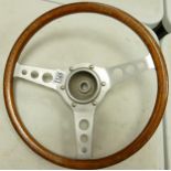 A vintage Styla wood rim steering wheel, 38cm diameter.