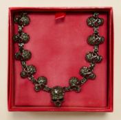 Butler & Wilson costume jewellery pewter effect diamante skull necklace