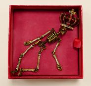 Butler & Wilson costume jewellery dull gold effect diamante crowned skeleton articulated brooch