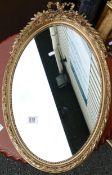 Oval gilt portrait wall mirror