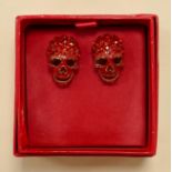 Butler & Wilson costumer jewellery pair of gold effect & red diamante skull earrings