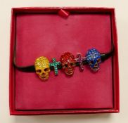 Butler & Wilson costume jewellery multi-colour diamante skull & crucifix bracelet on faux leather