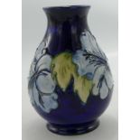 Moorcroft Hibiscus on Blue Ground Vase, height 13.5cm