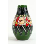 Moorcroft trial vase decorated with drummer lifeguards all around: Dated 2014, h.13.25cm.