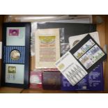 A collection of vintage collectors coins, first day stamp covers, 6 silk postcards, commemorative