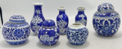 A collection of 20th Century Chinese Ginger Jars & vases with Prumus Decoration, tallest height 9.
