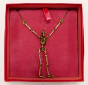 Butler & Wilson dull gold effect diamante skeleton necklace