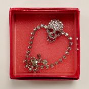 Butler & Wilson costume jewellery diamante and silver effect skull bracelet
