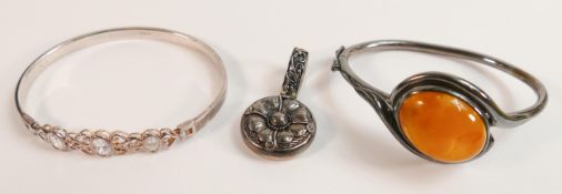 Silver jewellery including bangle set with mustard coloured stone, bracelet set with white stones