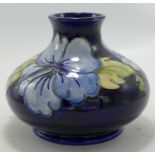 Moorcroft Hibiscus on Blue Ground Squat Vase, height 11cm