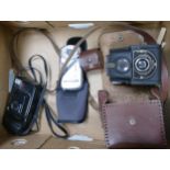 A collection of cameras to include Ensign , ful-fue camera, minnotla af-eii compact camera and