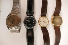 A collection of vintage gentleman's wristwatches including Eterna Matic 3000 Sevenday day date steel