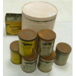A large F.M. Stamper & Co whole eggs storage tin together with six Ostermilk branded tins