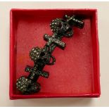 Butler & Wilson costume jewellery pewter effect diamante skull & crucifix bracelet on faux leather