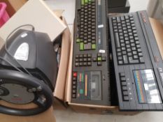 A mixed collection of vintage computers and gaming consoles ZX Spectrum 128K, Atari 2600, games,