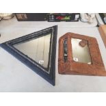 Two Artist made leather clad mirrors in Triangular Form